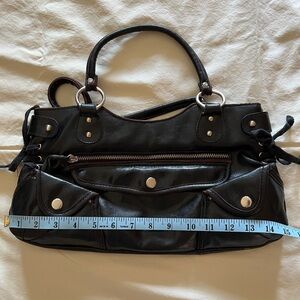Black Purse With Silver Zippers and Ties